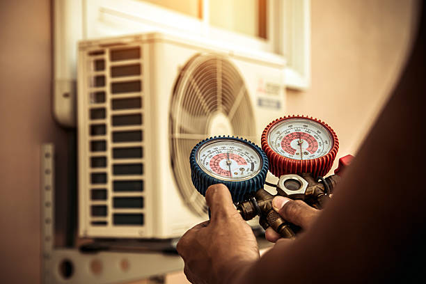 Professional Ac Installation technician working in Monticello, IA